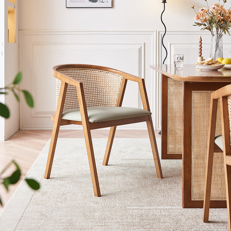 Waldron Rattan Dining Table Set detail showing table finish and proportions