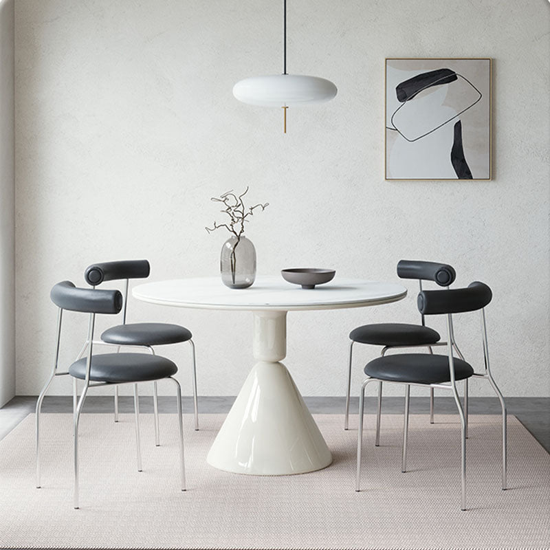Elmer Round Dining Table detail showing table finish and proportions