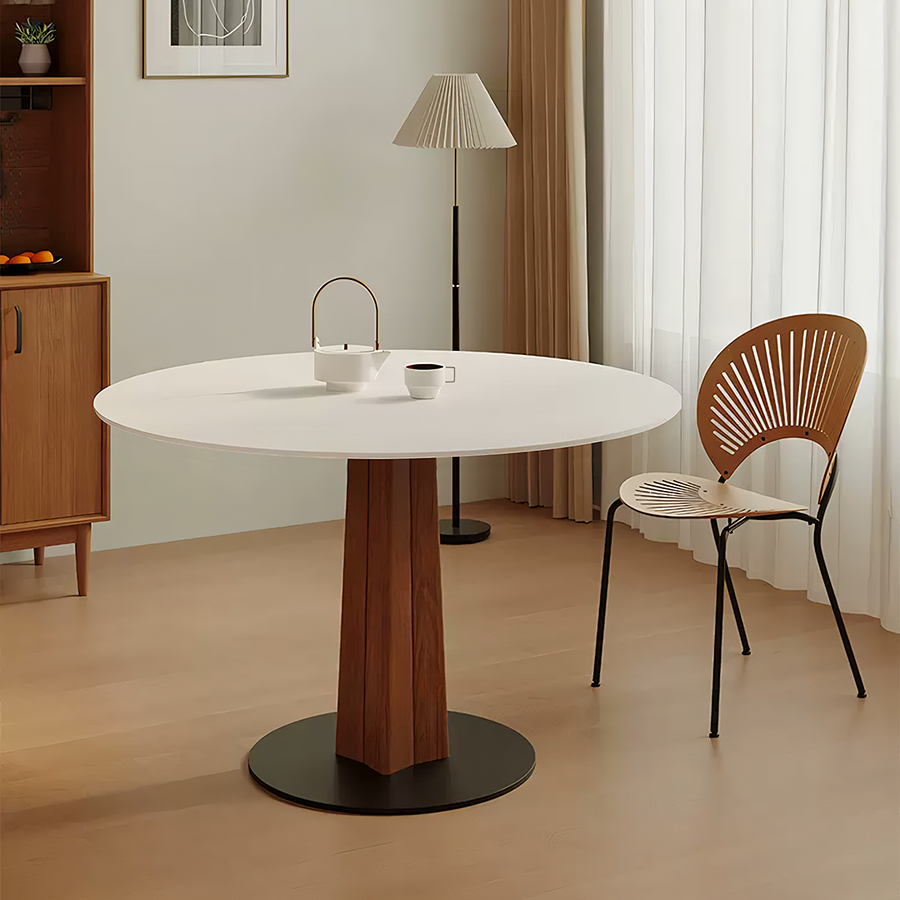 Percival White Round Dining Table lifestyle view with marble.dining table