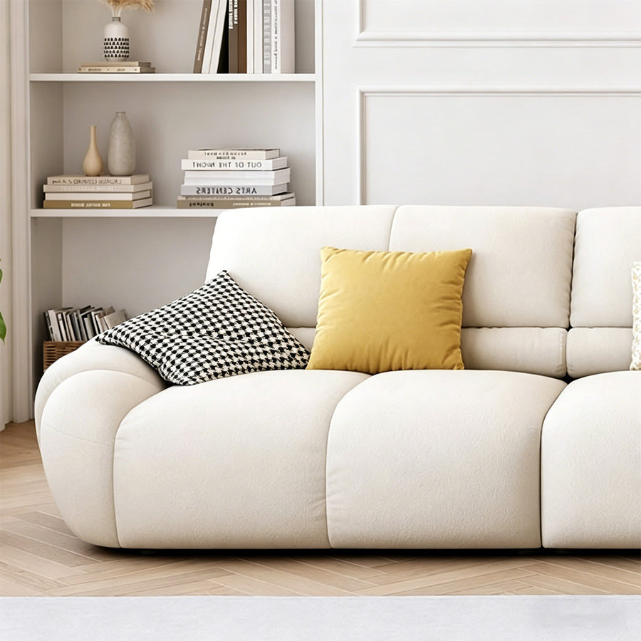 Gia Round Curved Three Seater Sofa side view showing sofa proportions