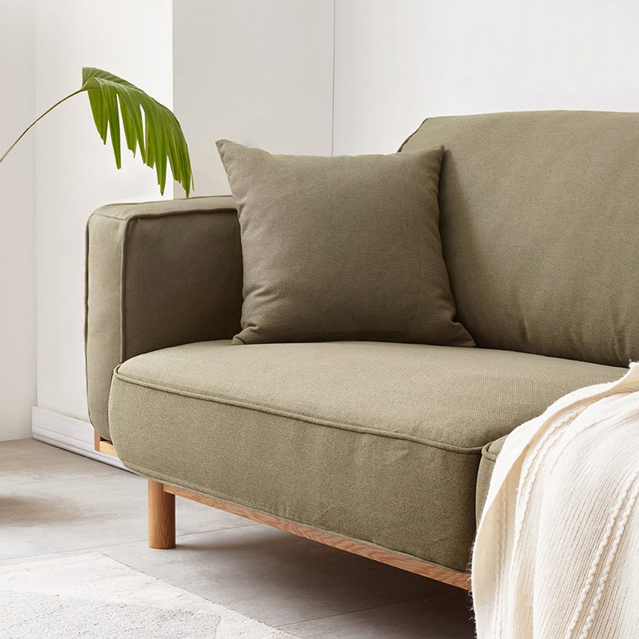 Villa Rattan Two Seater Sofa lifestyle view with small grey two seater sofa