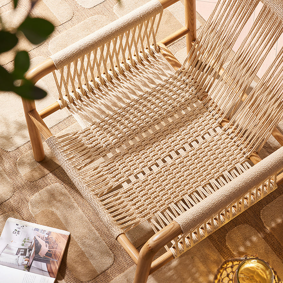 Zubkov Lounge Chair, Rattan & Solid Wood, Oak in a modern UK home