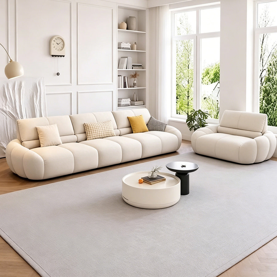 Gia Round Curved Three Seater Sofa lifestyle view with curved sofa UK