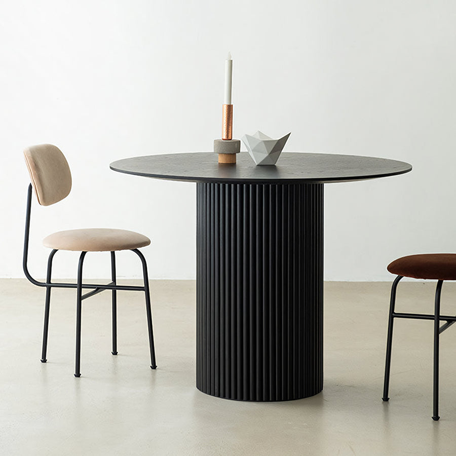 Ivar Round Dining Table detail showing table finish and proportions