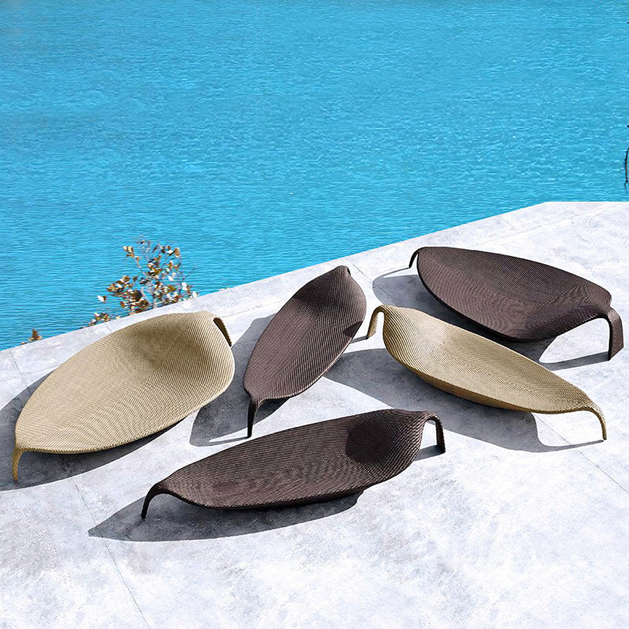 Escobar Garden Outdoor Sun Lounger, Rattan in a modern UK home