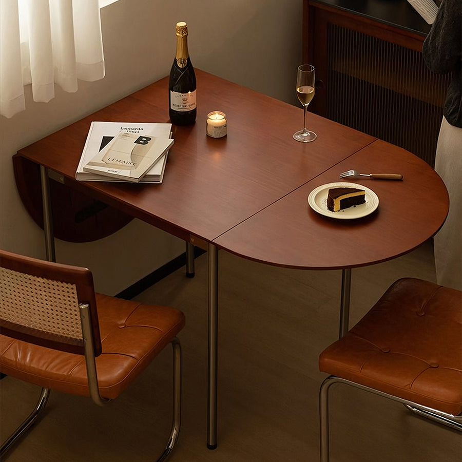 Tsvetkov Foldable Dining Table, Oval lifestyle view with oval wood dining room table