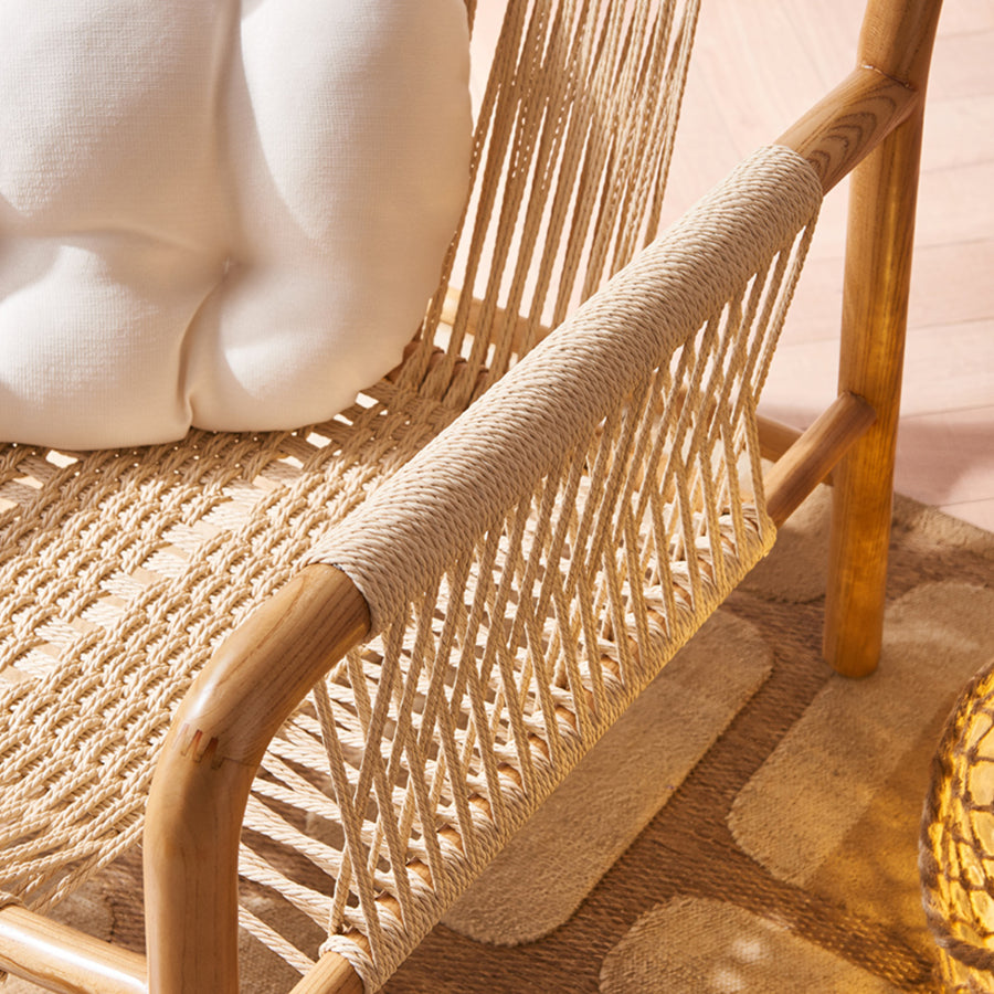 Zubkov Lounge Chair, Rattan & Solid Wood, Oak in a modern UK home