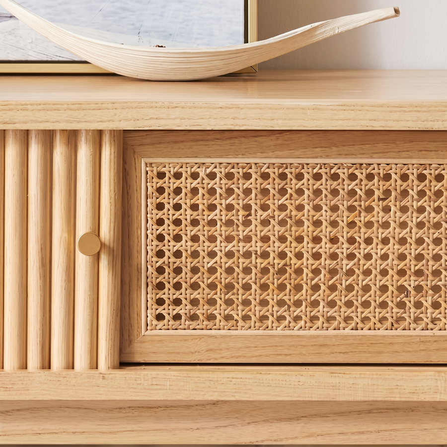 Wallace Rattan TV Stand room setting for TV storage
