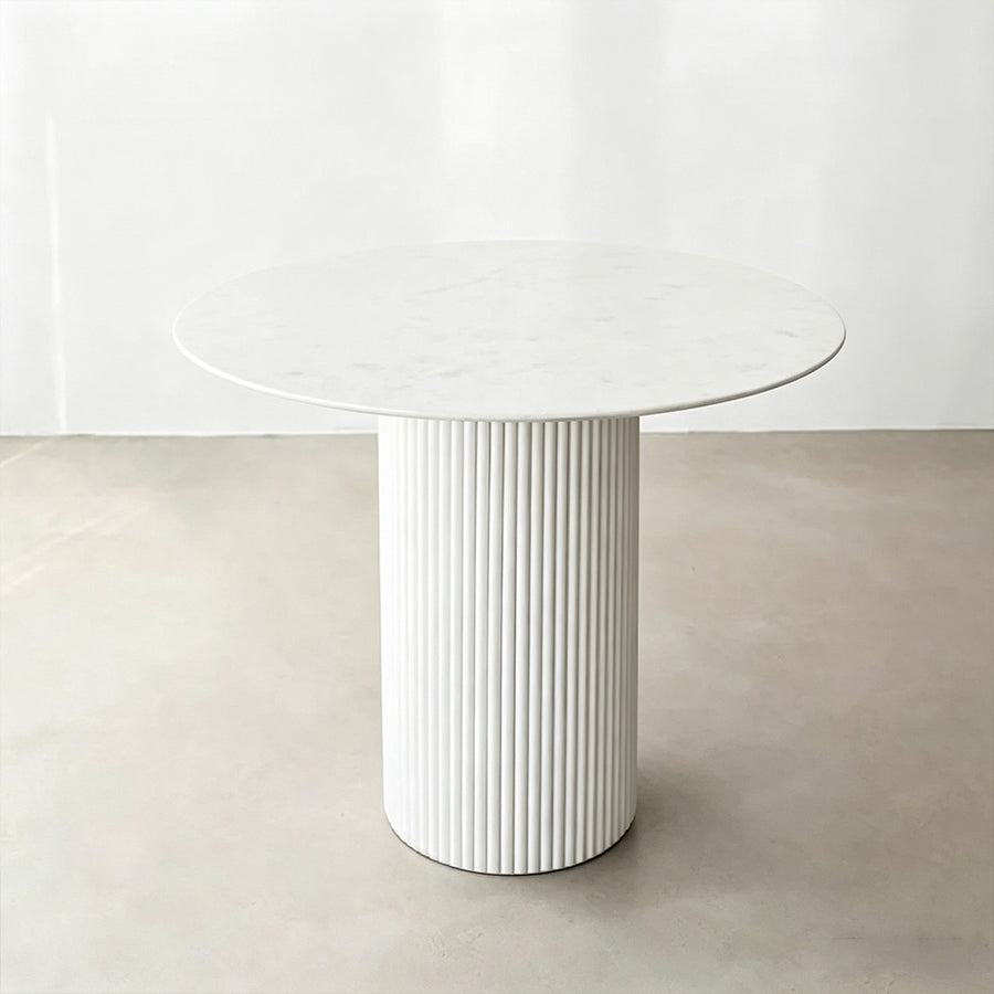 Ivar Round Dining Table detail showing table finish and proportions