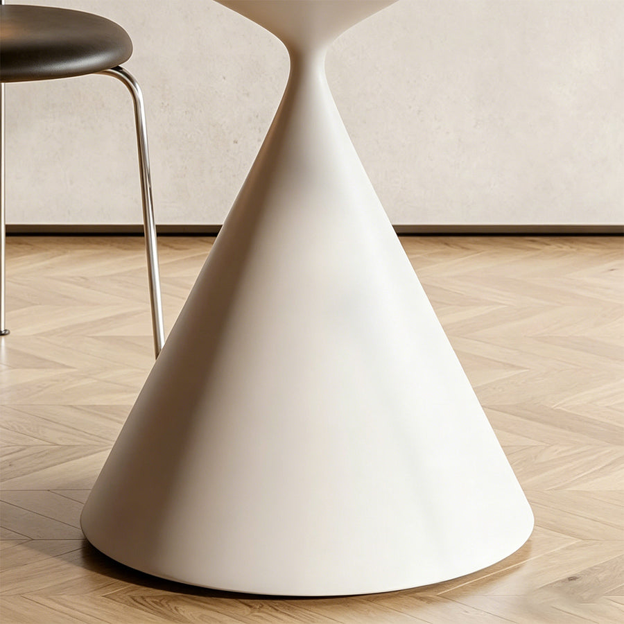 Ozzie Round Dining Table detail showing table finish and proportions