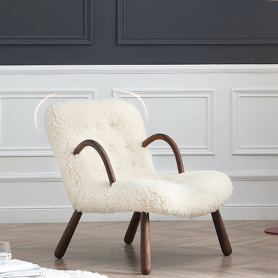 Philip Arc Sheepskin Armchair And Ottoman in a modern UK home