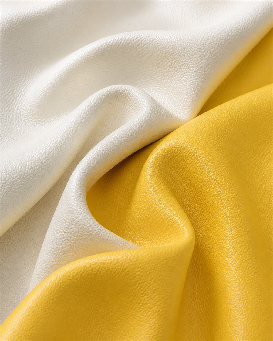 Burke yellow and white leathaire fabric close-up
