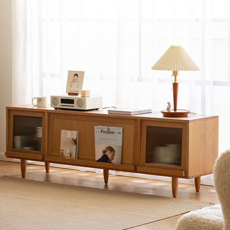 Gwendolyn Rattan TV Stand lifestyle view with solid wood tv stand