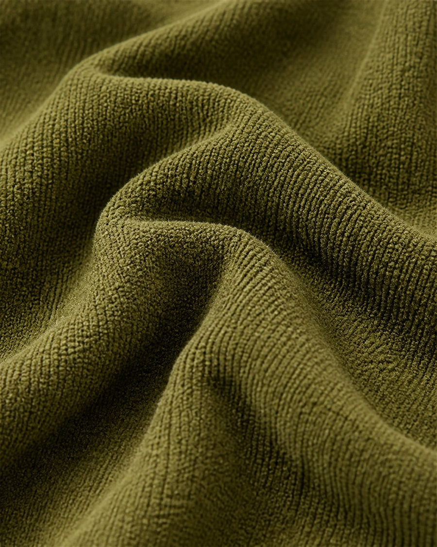 Qadir green chenille fabric close-up