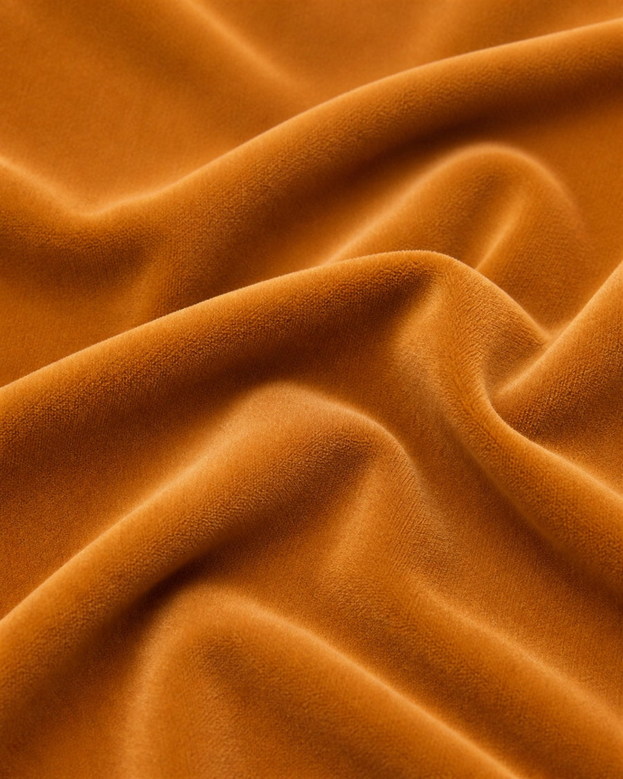 Soft Cloud orange velvet upholstery fabric close up